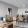 living area that includes ample seating spaces and bright lighting